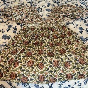 Maria dress with beautiful gold flakes throughout